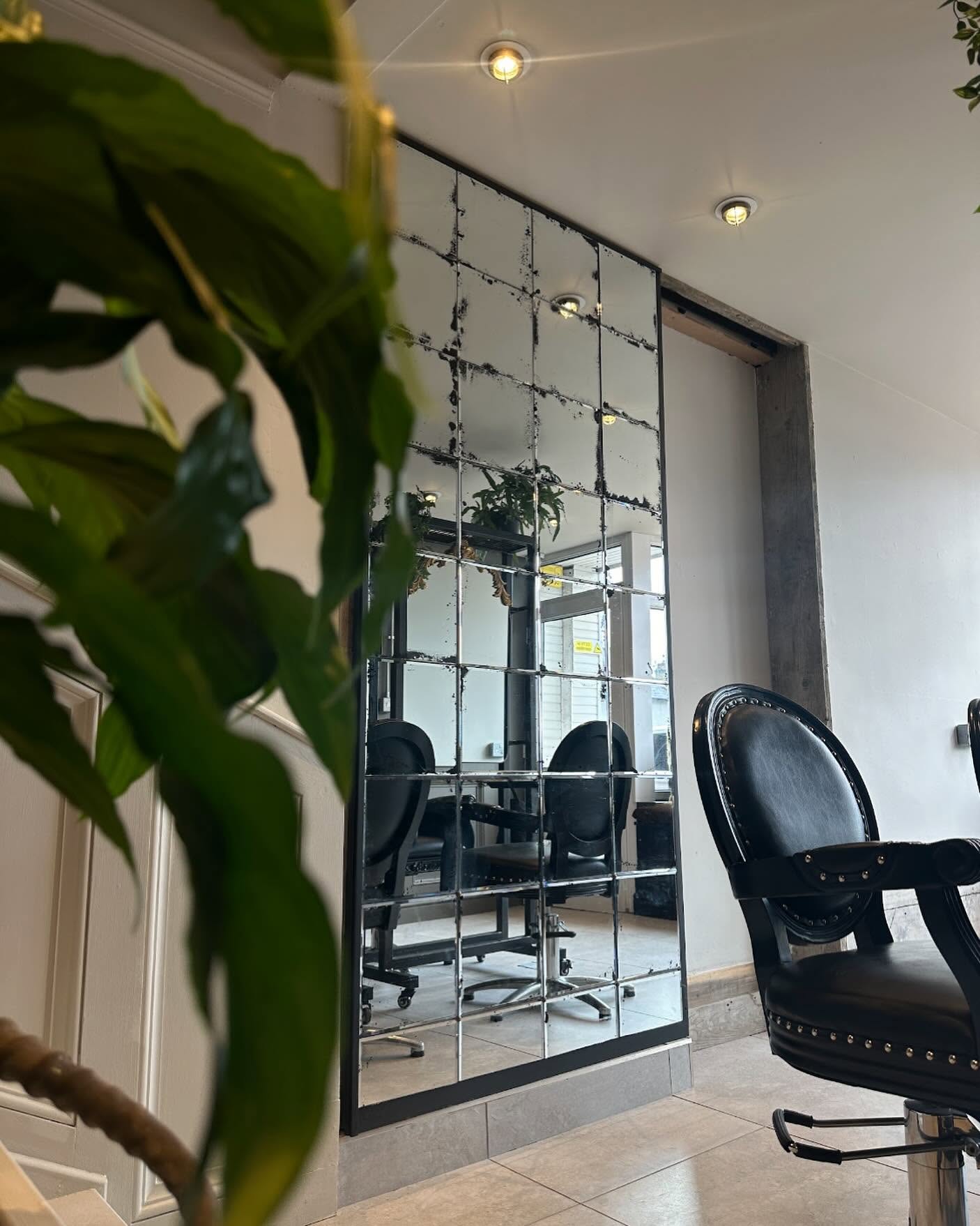 Antiqued mirror wall at Meraki Bespoke Hair Boutique